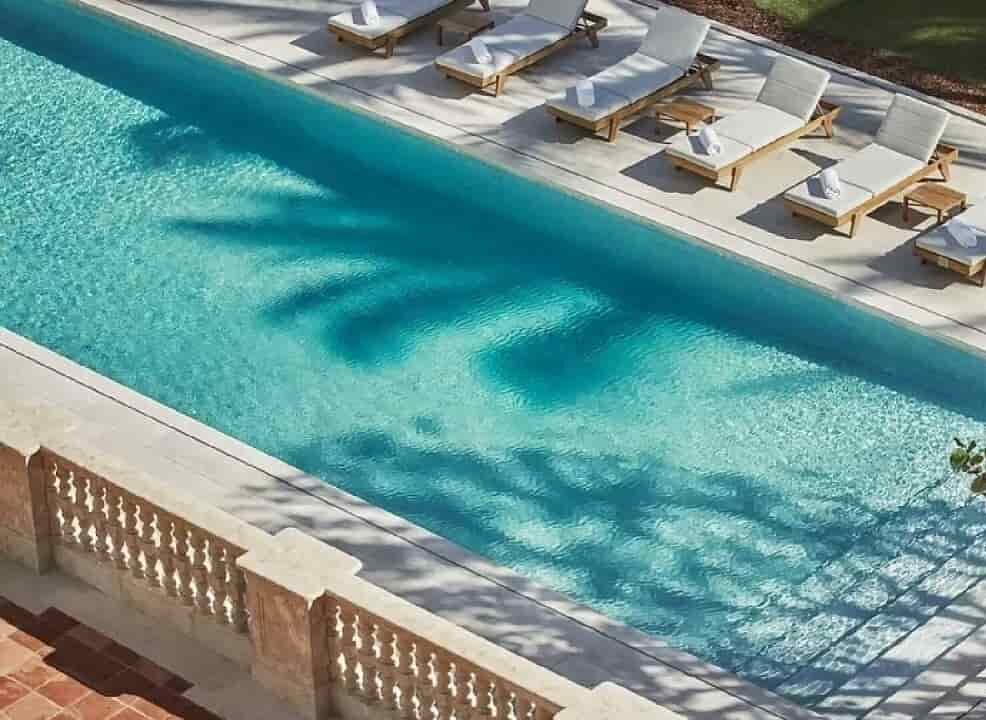 Miami Four Seasons surf club pool with thassos snow white marble by stone group marble supplier