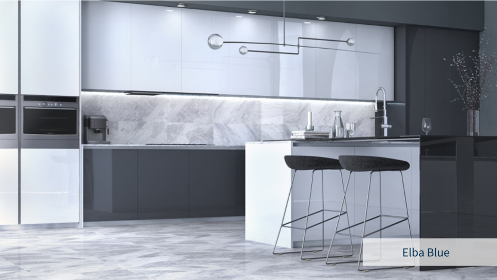 Image of a kitchen area in shades of gray with Elba Blue grey marble tiles installed in the floor and backsplash