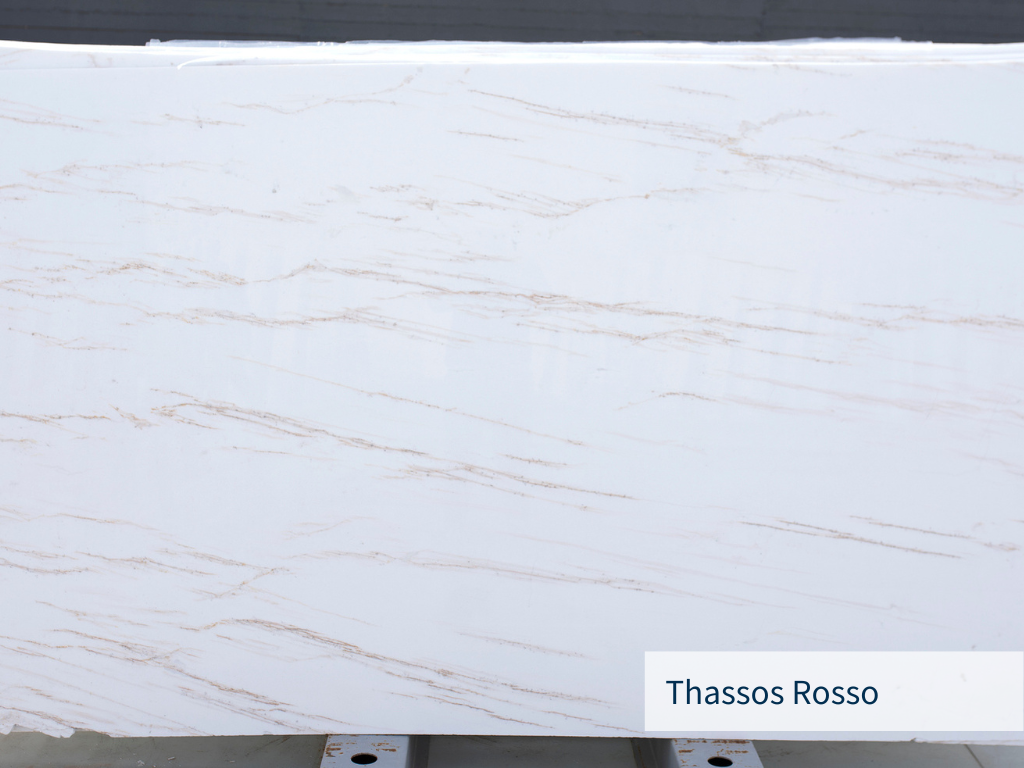 Thassos rosso marble with bright white color and slightly red veins on its surface
