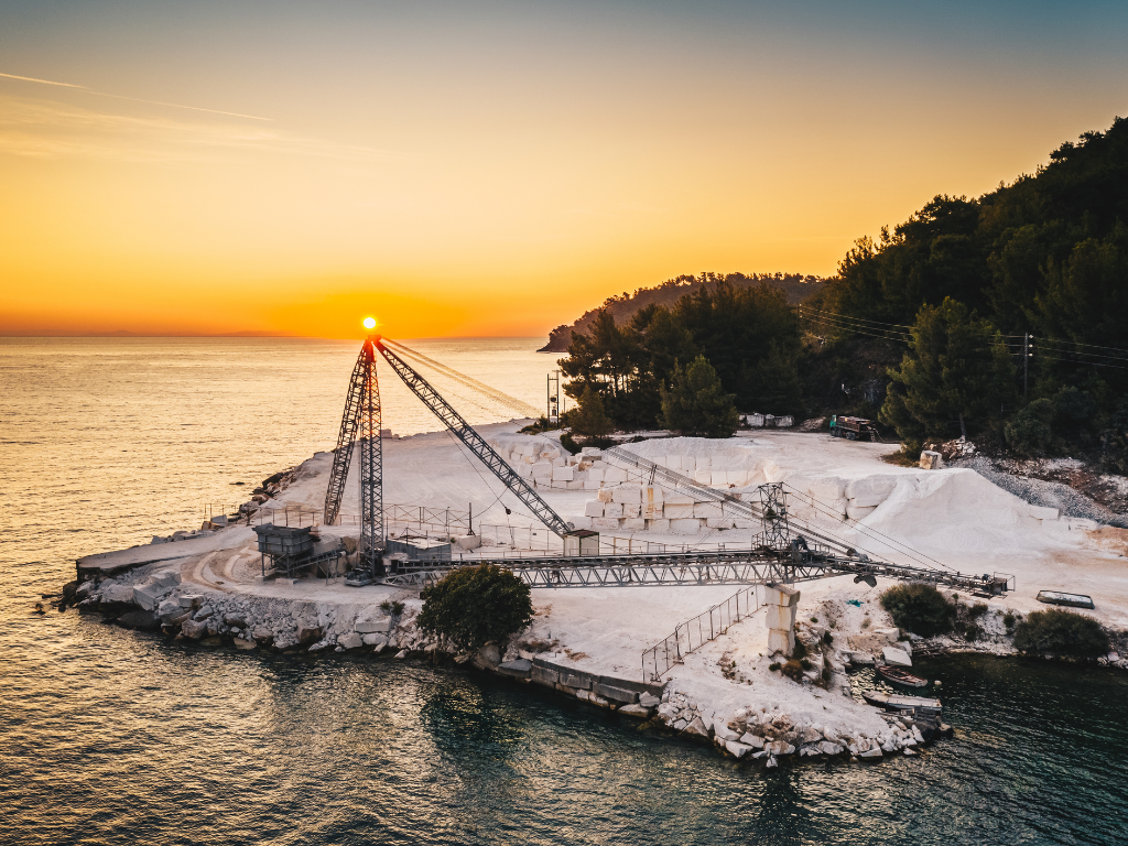 Thassos White marble quarry photo in Thassos, Greece, at sunset. Types & Dimensions Of Thassos White Marble Tiles.