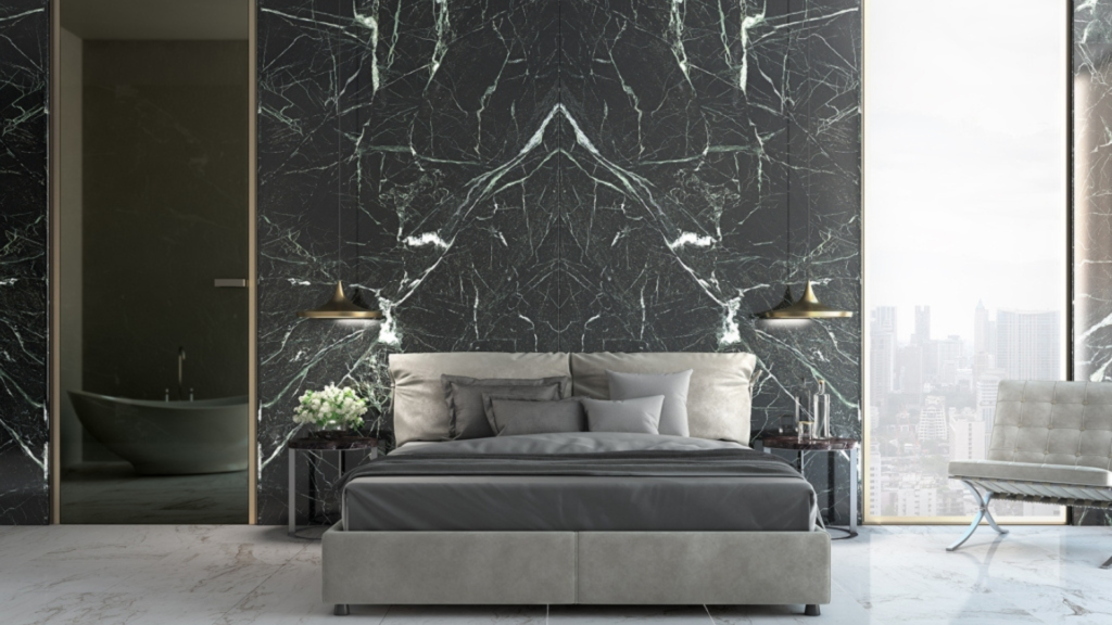 Veria green marble slabs in book match in rendering with dark green color and distinctive white veins