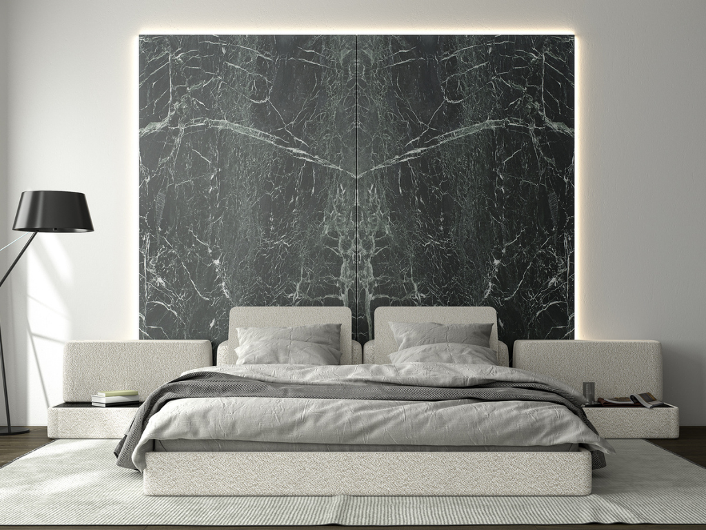 Green colored marble veria green in bookmatch rendering, with white veins, placed above headboard. Some Of The Best-colored Marbles That You Need To Know
